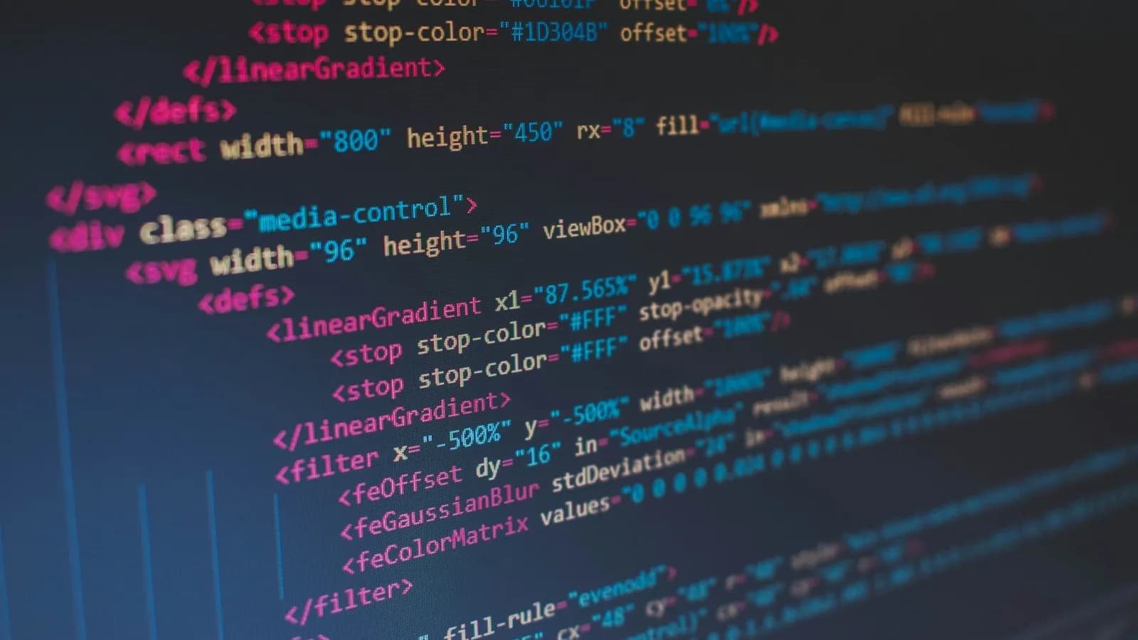 Lines of HTML code on a dark computer screen